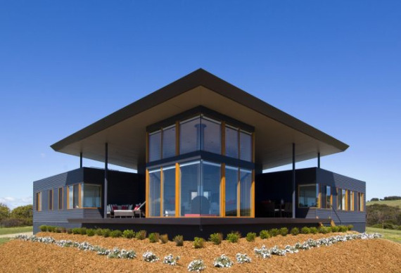 The corrugated structure of this Emu house with timber windows, decks 
